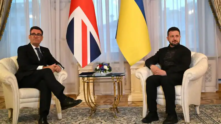 UK and Ukraine leaders in discussion during diplomatic meeting.